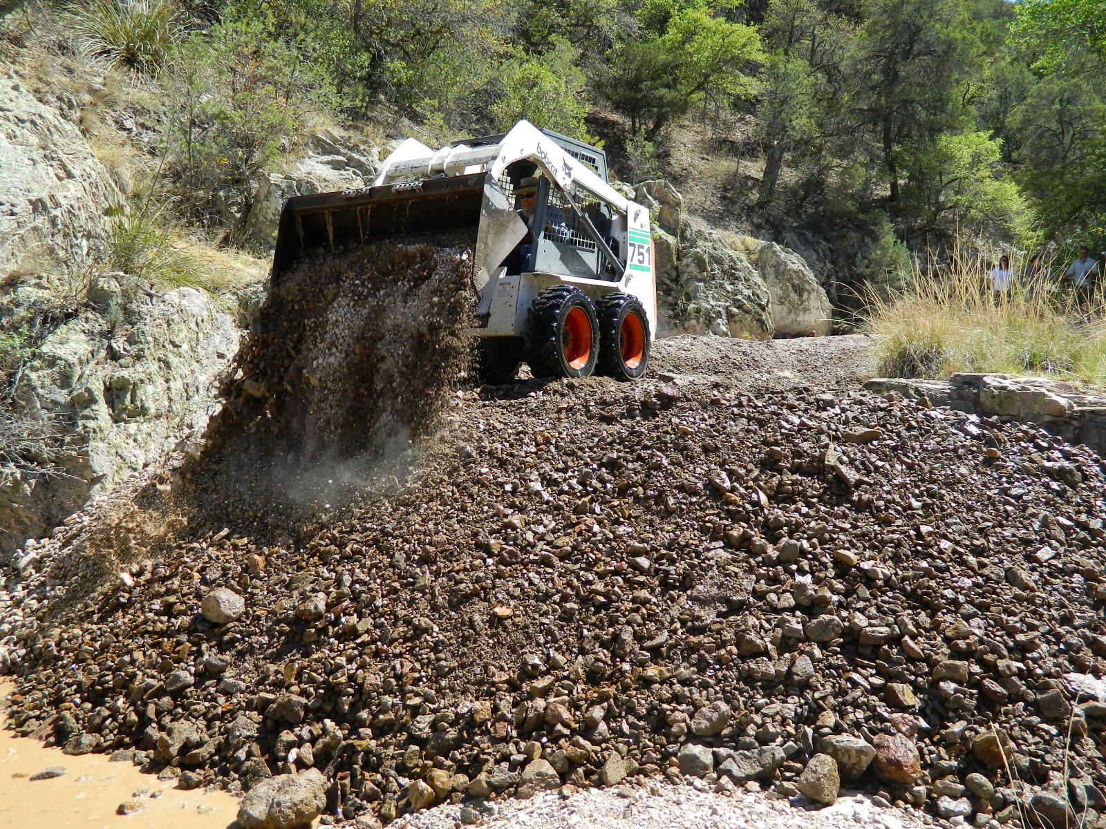 Stone 5 bobcat worker
